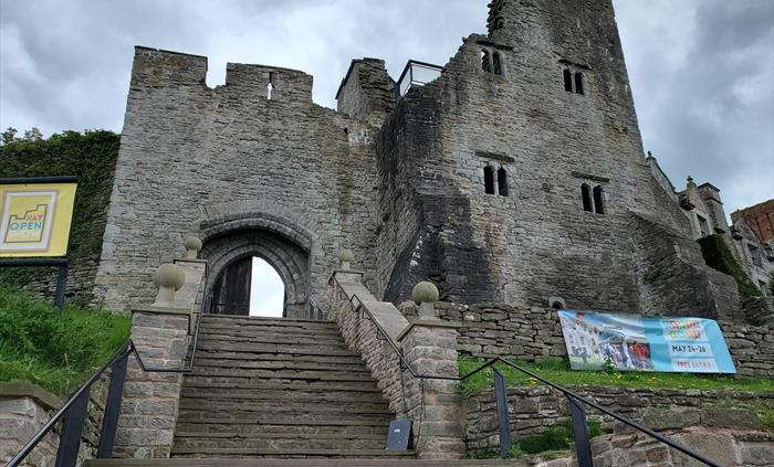 Picture of the front of Hay-on-Wye Castle, leading up the main steps